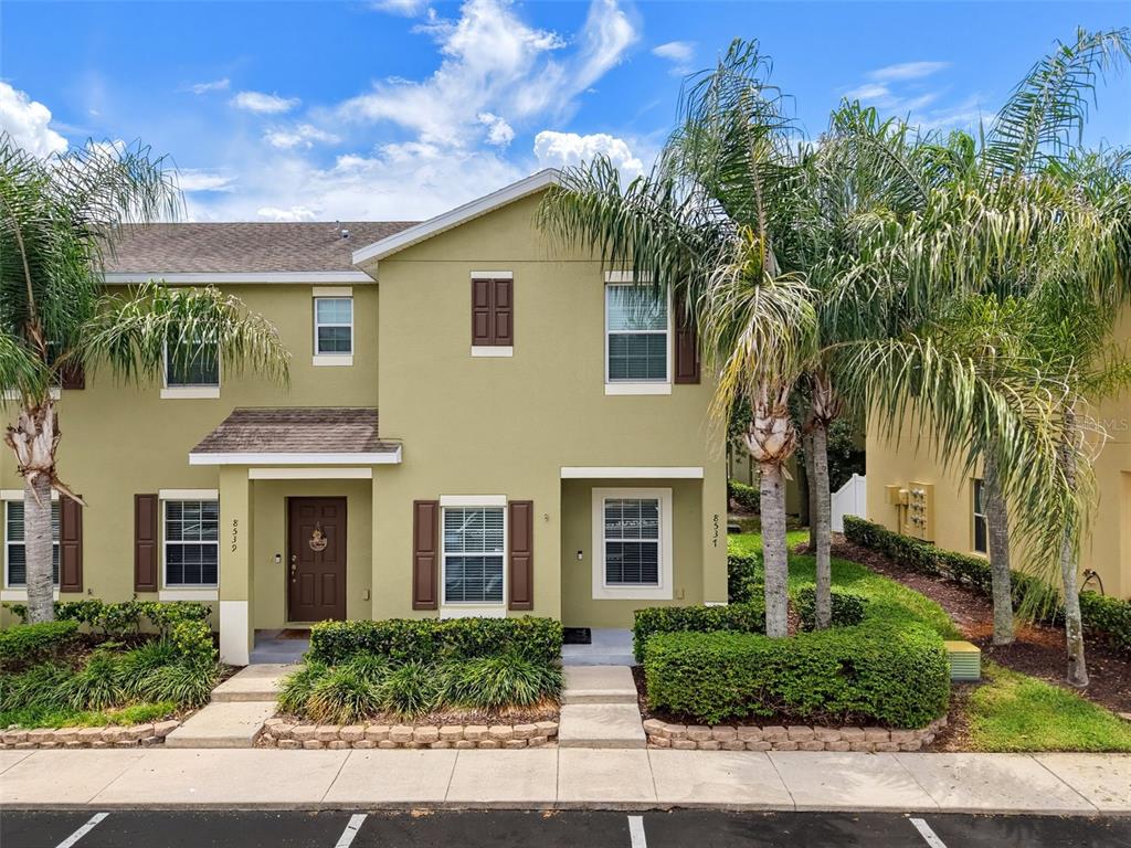 A kitchen with light wood cabinets, granite countertops, stainless steel appliances, and tile flooring — 8537 BRUSHLEAF WAY, TAMPA, FL