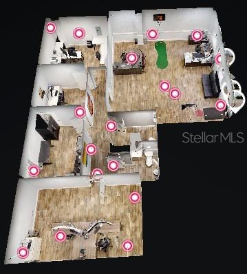 This 3D floor plan shows an office space with multiple workstations, a putting green, and restrooms — 109 COMMERCE STREET UNIT 109, LAKE MARY, FL