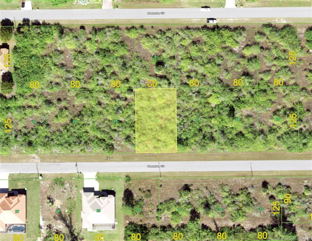 This is an aerial map showing a highlighted vacant residential lot among surrounding undeveloped parcels — 15771 STAUNTON CIRCLE, PORT CHARLOTTE, FL