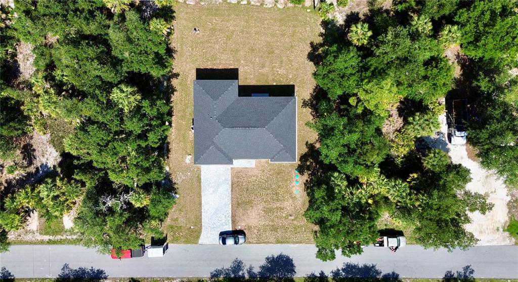 This is a floor plan for a four-bedroom, two-bathroom house with a two-car garage — 3297 AUDETTE STREET, PORT CHARLOTTE, FL