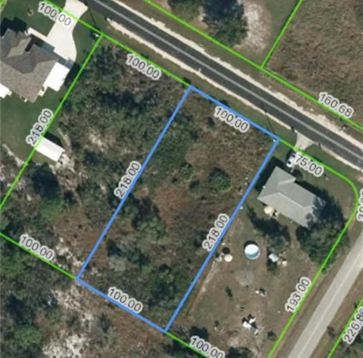 This aerial map shows a rectangular vacant lot outlined in blue with dimensions labeled — 1995 Clam Drive, Sebring FL 33870, SEBRING, FL