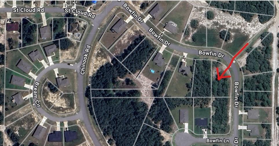An aerial map view shows a vacant residential lot highlighted by a red arrow — 364 BOWFIN DRIVE, POINCIANA, FL