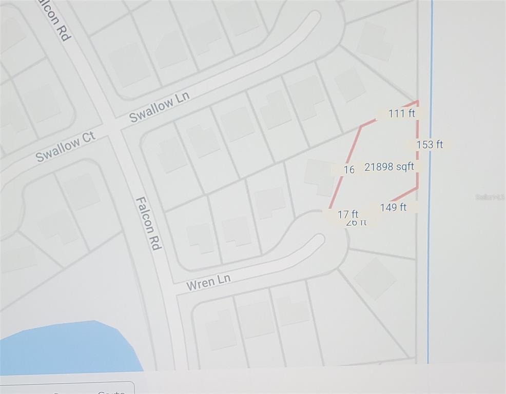 This is a map showing the property boundaries and dimensions for a residential lot — 709 WREN LANE, POINCIANA, FL