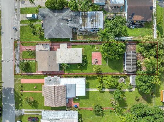 Aerial view of a residential property featuring a house, a detached shed, and a yard — 2847 Polk St # 0, Hollywood FL 33020, HOLLYWOOD, FL