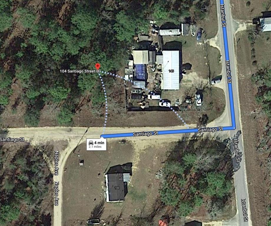 This is an aerial map view showing a residential property with structures and street names — 104 SANTIAGO STREET, INTERLACHEN, FL