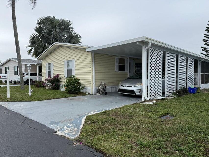 6085 Seashore Drive, Atlantis FL 33462