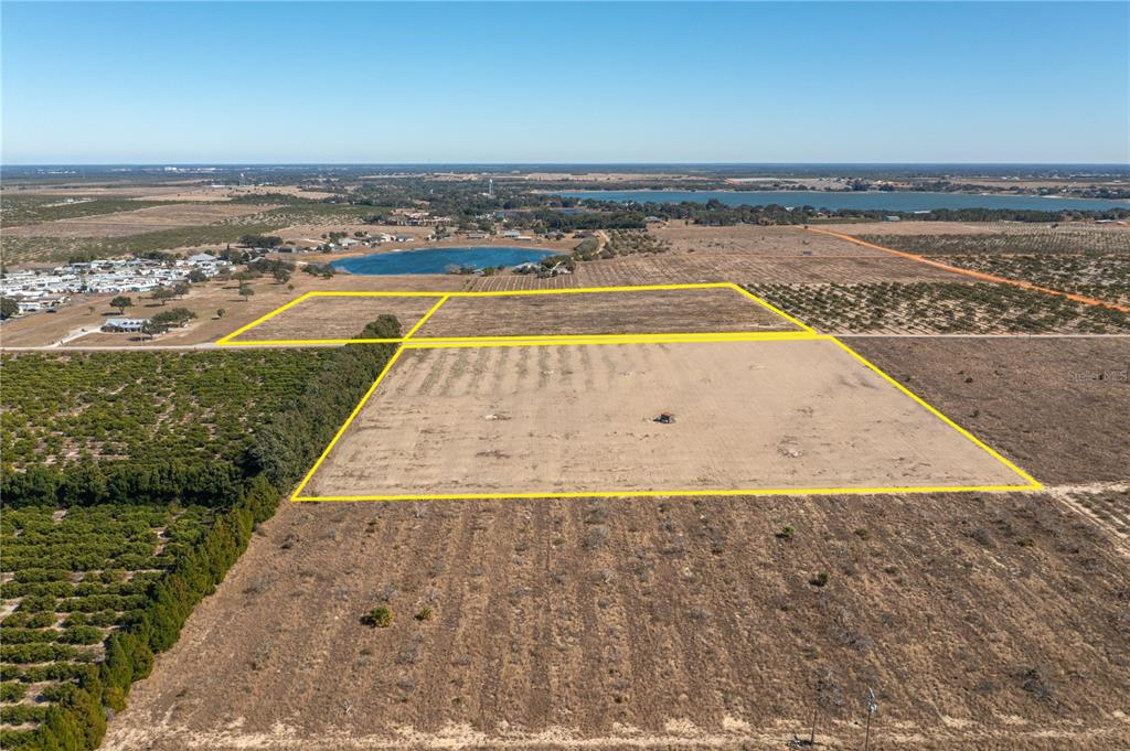 An aerial view shows a large, cleared rectangular plot of land outlined in yellow — TOWNSEND ROAD, LAKE WALES, FL