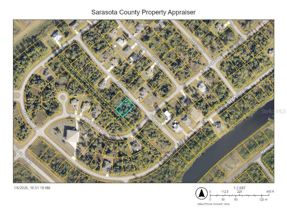 This is a satellite map showing a highlighted vacant lot located at a street intersection — FILBERT STREET, NORTH PORT, FL