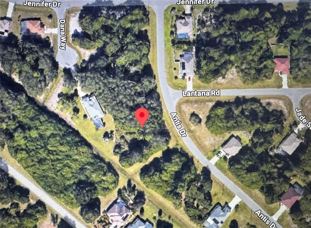 This is an aerial map view showing a vacant lot marked with a red pin — 155 ANTIS DRIVE, ROTONDA WEST, FL