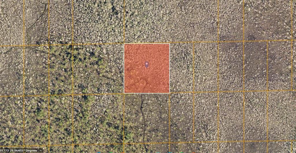 This is an aerial map view showing a highlighted square plot of land — N/A, DELAND, FL