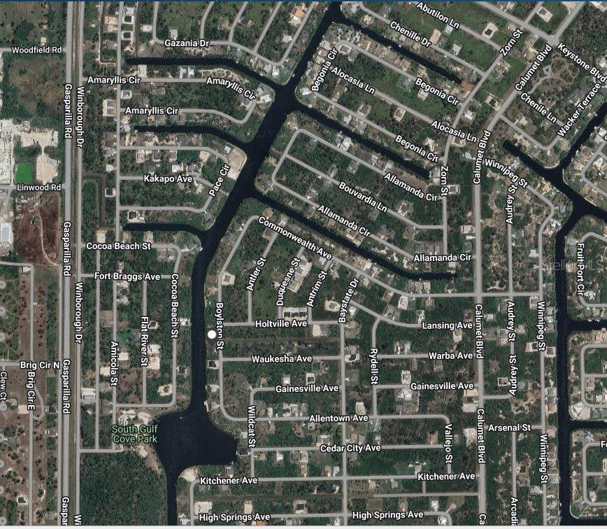 This is an aerial map view of a residential neighborhood with canals and streets — 10091 BOYLSTON STREET, PORT CHARLOTTE, FL