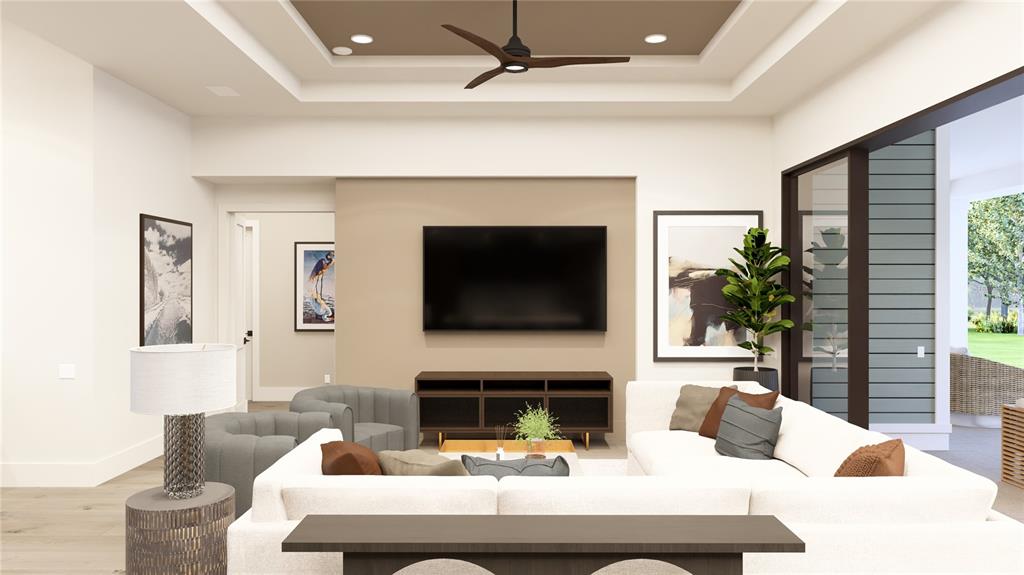 This rendering shows a modern living room with a tray ceiling, sectional sofa, and television — 6023 SW 124TH WAY, ARCHER, FL