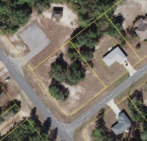 This aerial map shows a vacant corner lot situated between two residential streets — SW 36TH AVENUE, OCALA, FL