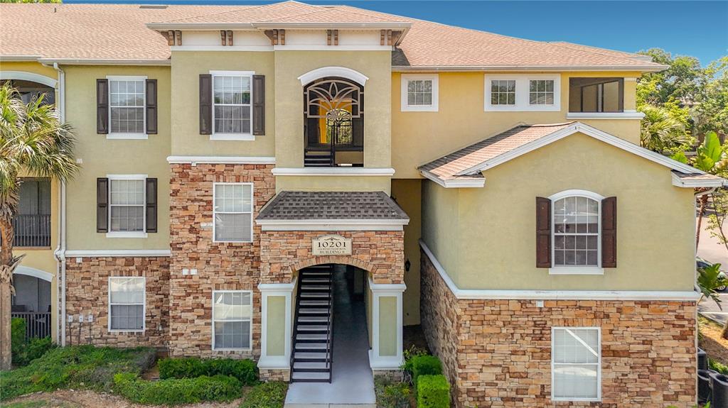 10201 COURTNEY PALMS BOULEVARD UNIT 203