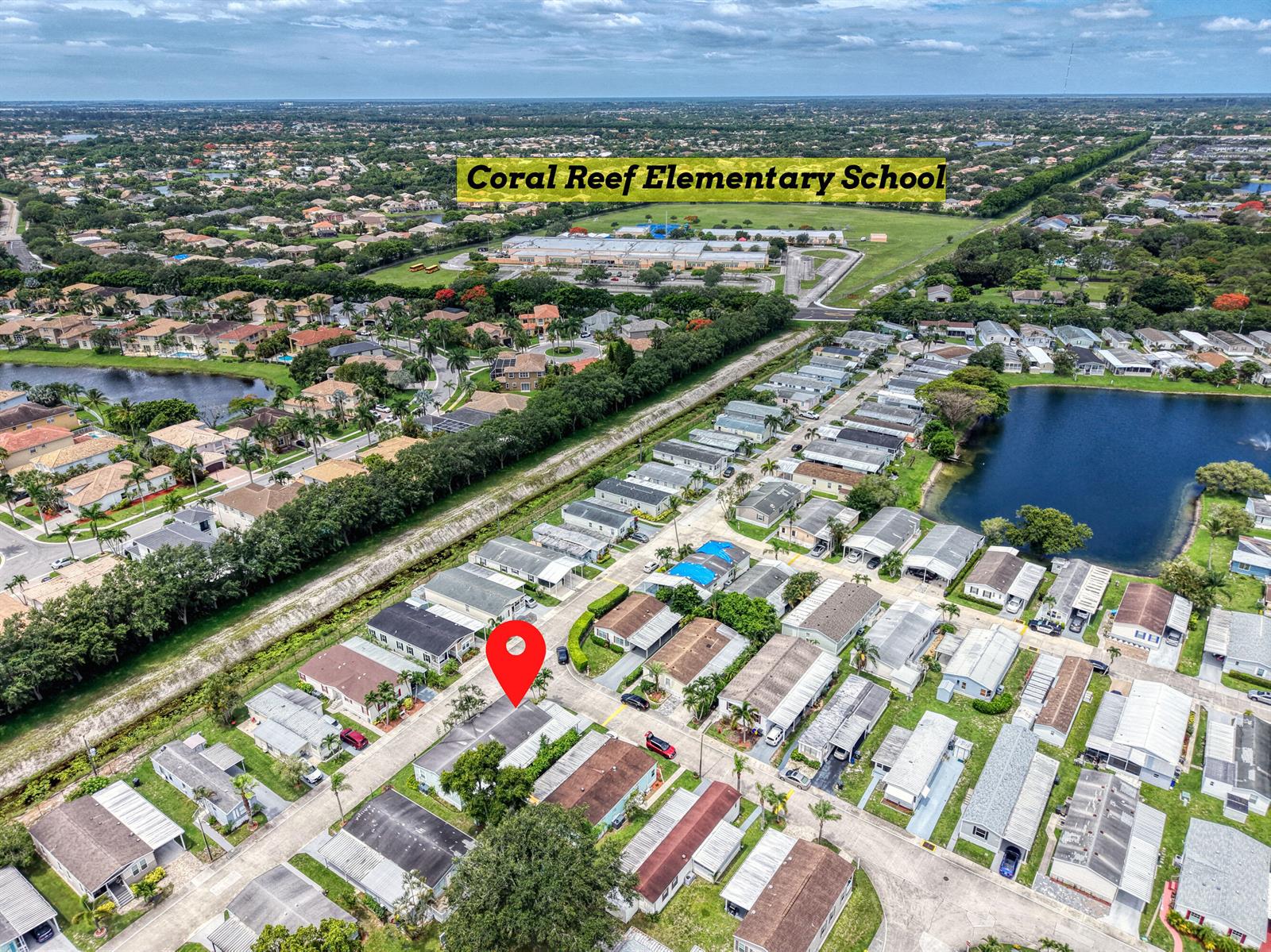 An aerial view shows a residential neighborhood with a red location pin on a house — 59 Plantation Blvd, Lake Worth FL 33467, LAKE WORTH, FL