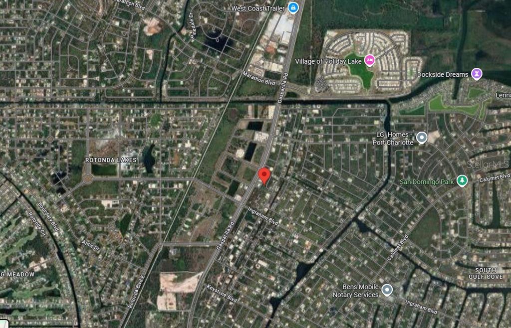 This is a satellite map view of a residential neighborhood in Florida — 8297 DIMSTEAD STREET, PORT CHARLOTTE, FL