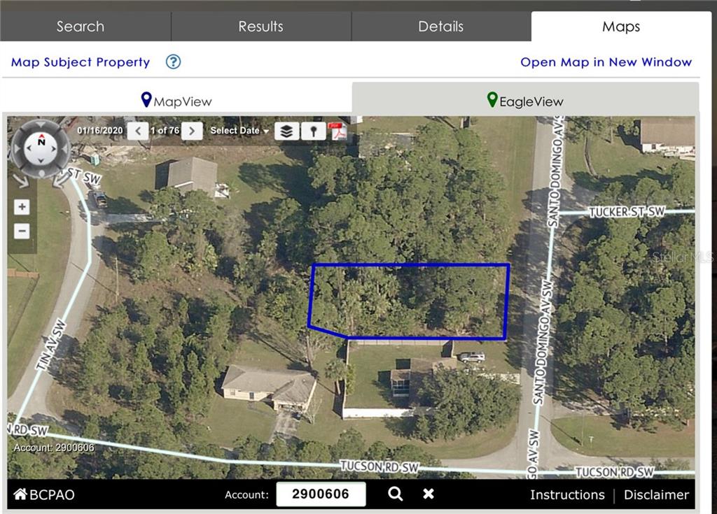This is an aerial map view showing a vacant, wooded lot outlined in blue — 484 SANTO DOMINGO AVENUE SW, PALM BAY, FL