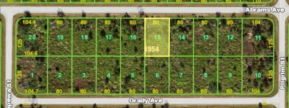 This is a map showing a rectangular plot of land highlighted in yellow among others — 12085 ABRAMS AVENUE, PORT CHARLOTTE, FL