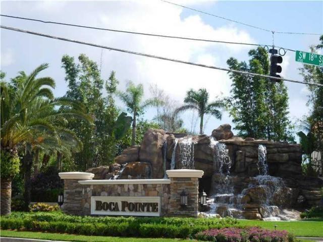 A stone entrance sign for Boca Pointe features a tiered waterfall against a rock formation — 6584 Via Regina, Boca Raton FL 33433, BOCA RATON, FL