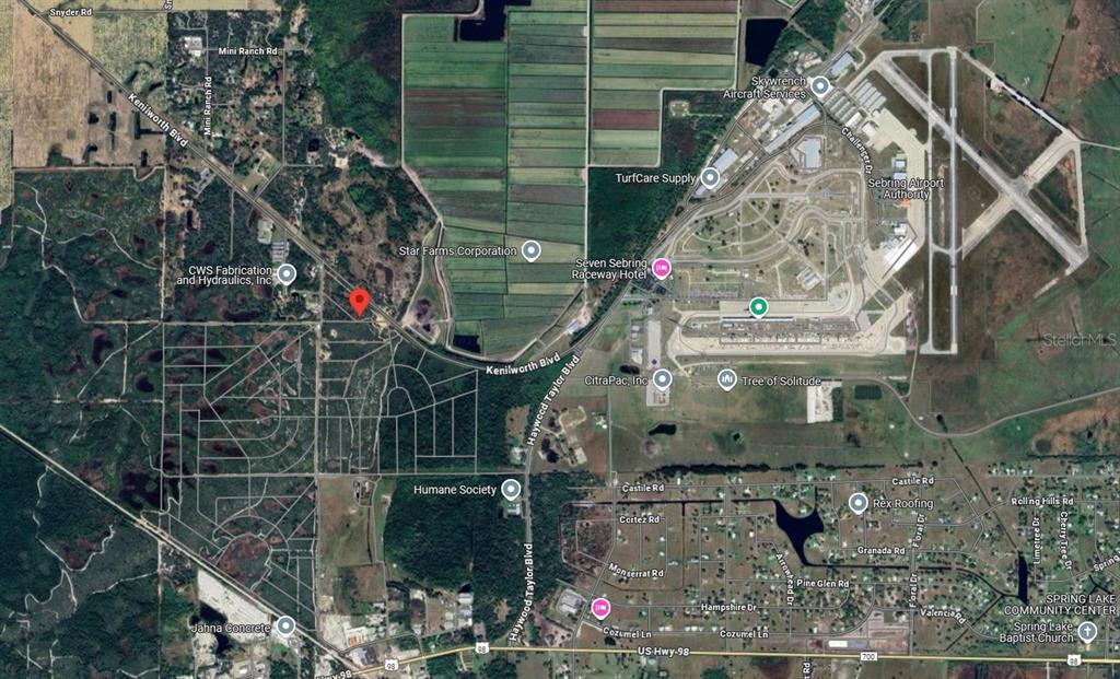 This is an aerial map showing a rural area with roads, businesses, and an airport — 6115 PEAR BLOSSOM STREET, SEBRING, FL