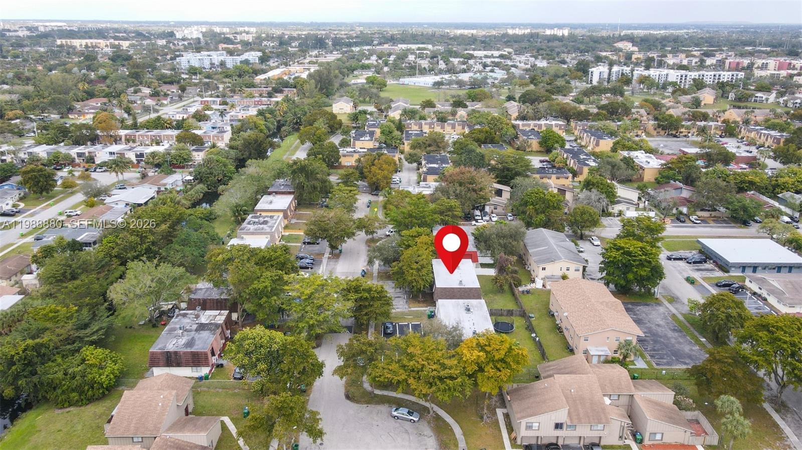 An aerial view shows a residential neighborhood with a red location pin over a building — 2260 NW 59th Way, Lauderhill FL 33313, LAUDERHILL, FL