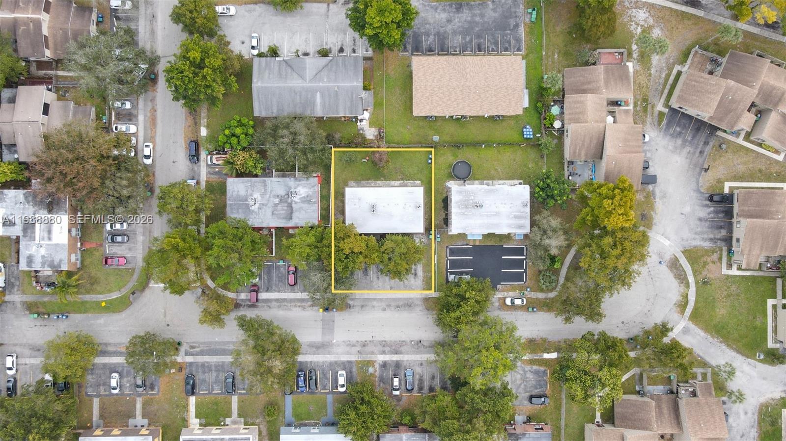 This aerial view shows a rectangular residential property lot outlined in yellow — 2260 NW 59th Way, Lauderhill FL 33313, LAUDERHILL, FL