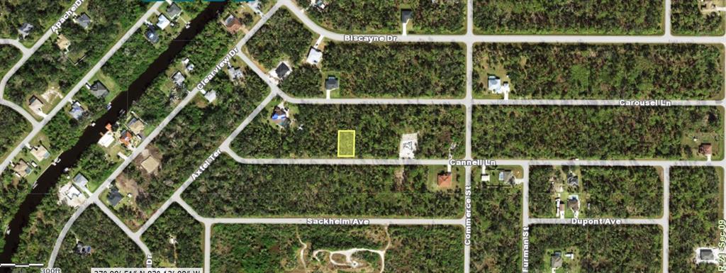 This aerial map shows a vacant rectangular lot highlighted in yellow along Cannell Lane — 14340 CANNELL LANE, PORT CHARLOTTE, FL