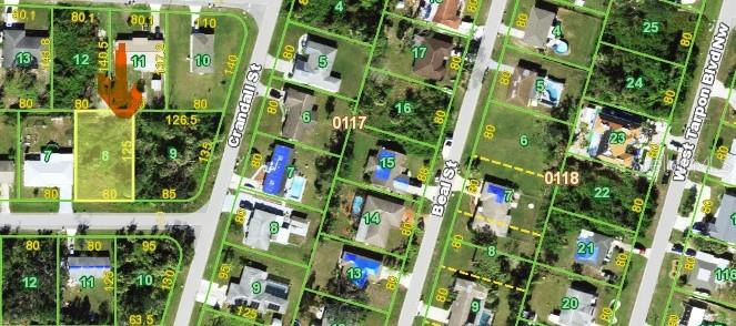 This is an aerial map showing residential property lots and street layouts — 510 JASMINE AVENUE NW, PORT CHARLOTTE, FL