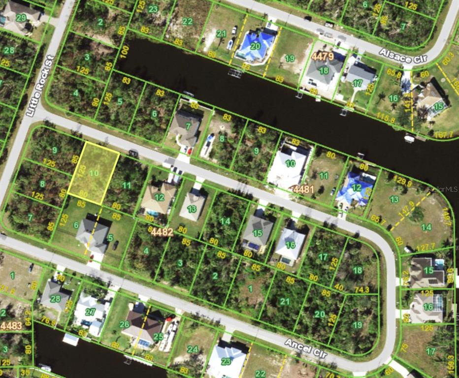 This is an aerial map showing residential lots and a canal in a suburban neighborhood — 15311 ANCEL CIRCLE, PORT CHARLOTTE, FL
