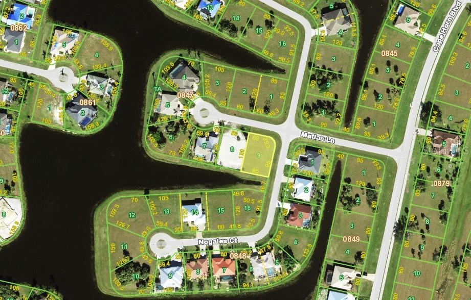 This is an aerial map showing residential lots, cul-de-sacs, and surrounding bodies of water — 24355 MATIAS LANE, PUNTA GORDA, FL