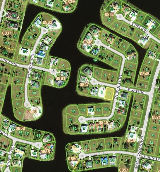 This is an aerial map showing residential lots and waterways in a suburban neighborhood — 24355 MATIAS LANE, PUNTA GORDA, FL