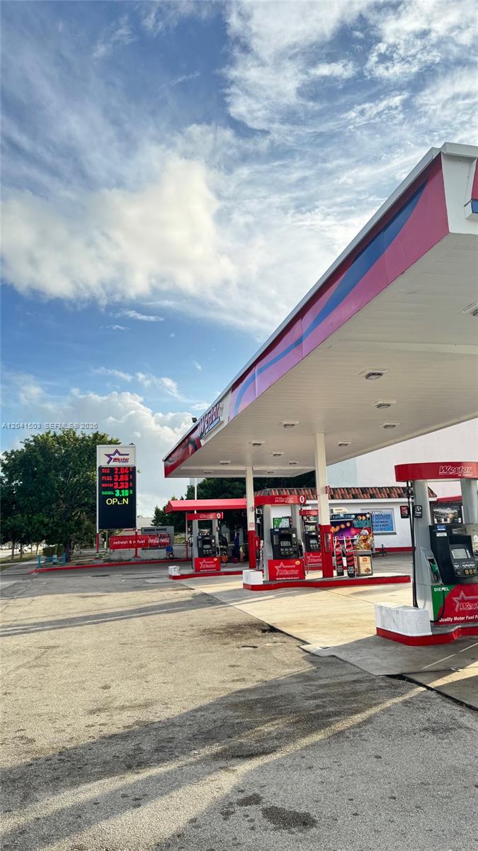 A Westar gas station with fuel pumps under a canopy and a price sign — 6776 SW 117th Ave, Miami FL 33183, MIAMI, FL