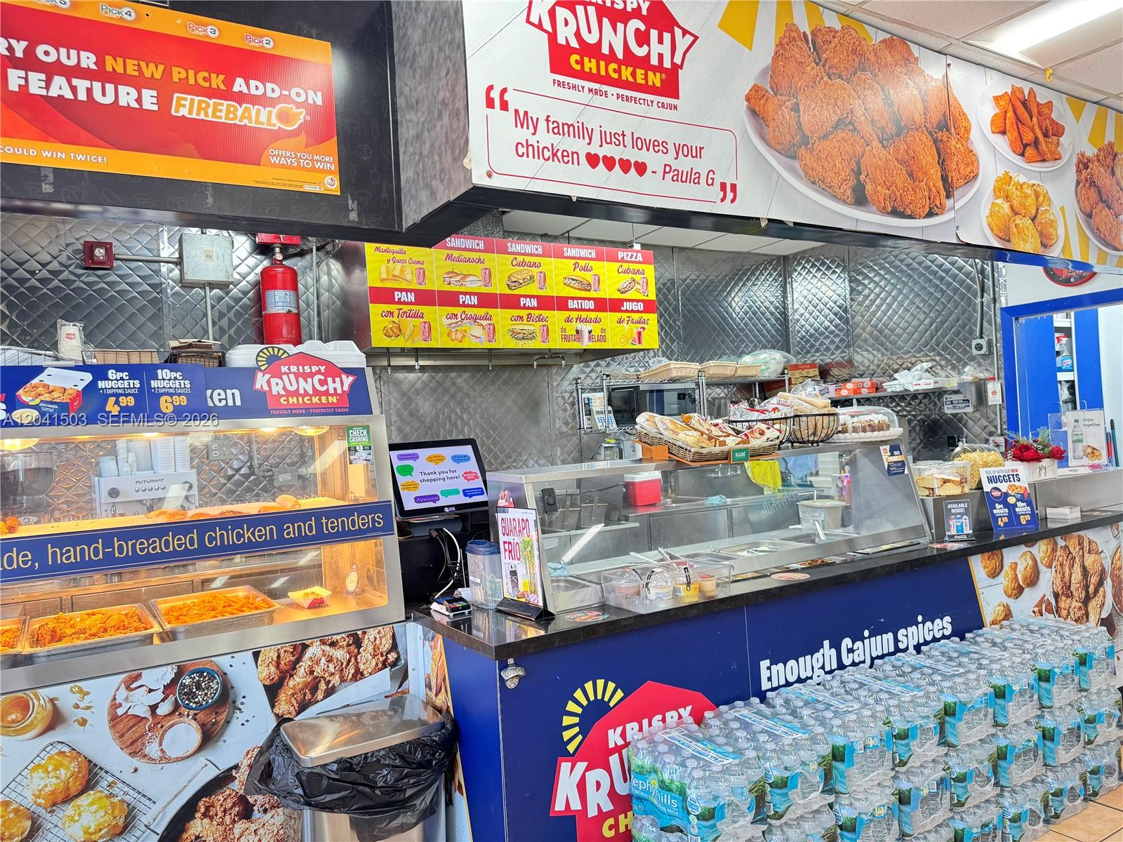 The interior of a fast-food restaurant features a service counter, menu boards, and food displays — 6776 SW 117th Ave, Miami FL 33183, MIAMI, FL