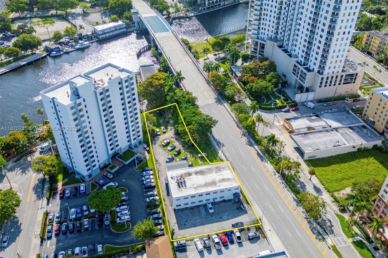 An aerial view shows a commercial building with a parking lot outlined in yellow — 529 W Flagler St, Miami FL 33130, MIAMI, FL