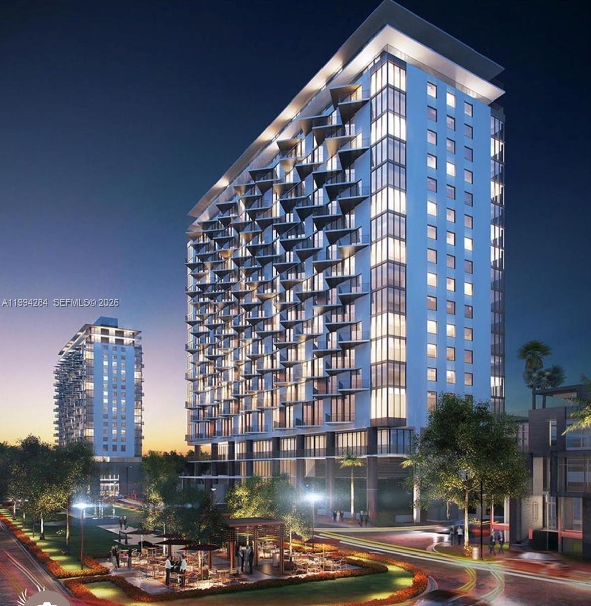 This is an architectural rendering of a modern high-rise apartment building at dusk — 5300 NW 85 # 1106, Doral FL 33166, DORAL, FL