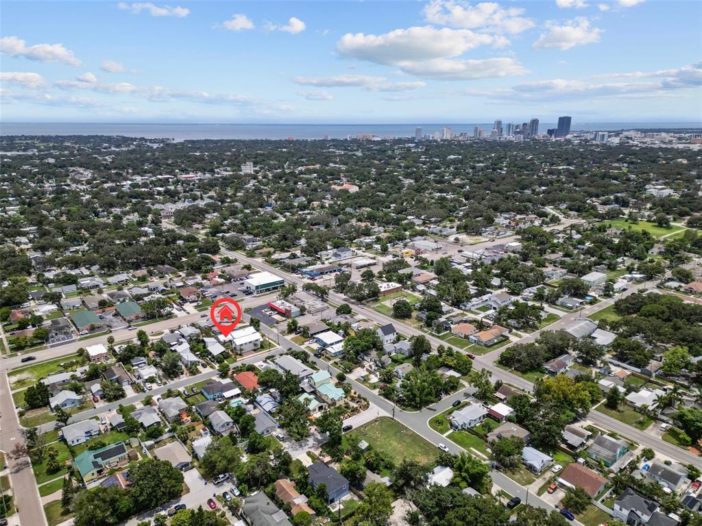 An aerial view shows a residential neighborhood with a red house icon marking a property — 1623 31ST AVENUE N, ST PETERSBURG, FL