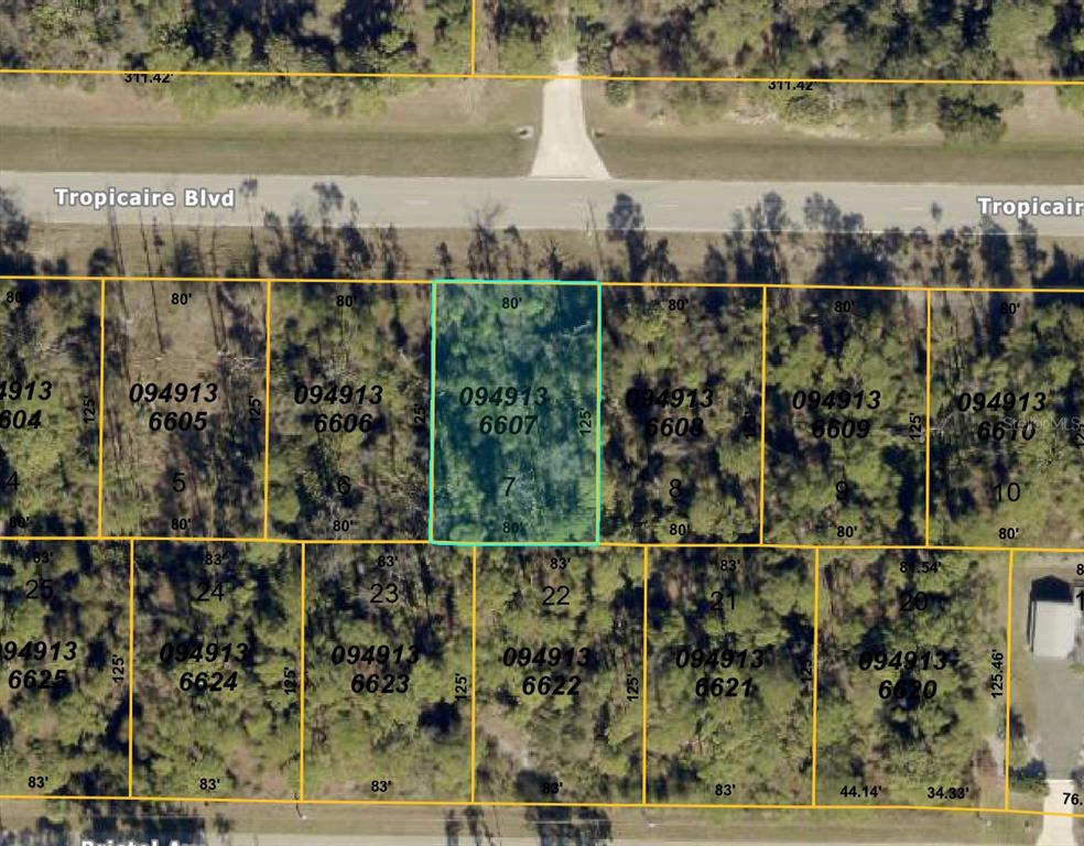 This is a map showing a highlighted rectangular land parcel among other adjacent lots — TROPICAIRE BOULEVARD, NORTH PORT, FL