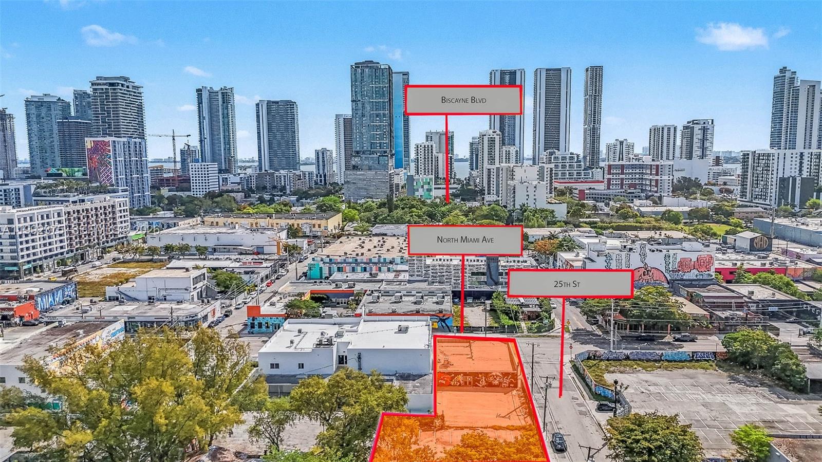 An aerial view shows a vacant urban lot highlighted in orange near city streets — 2500 N Miami Ave, Miami FL 33127, MIAMI, FL