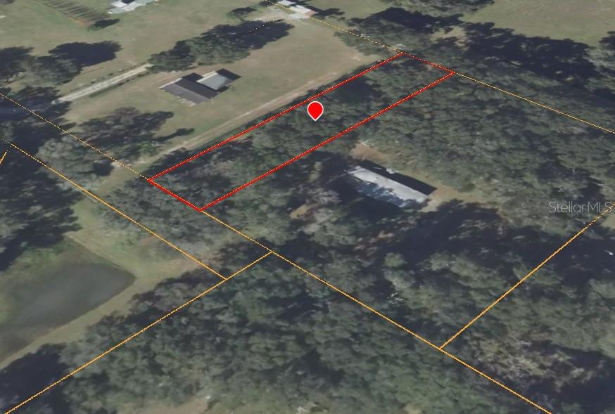 This is an aerial map showing a rectangular plot of land outlined in red — 0 SE 39TH AVENUE, OCALA, FL