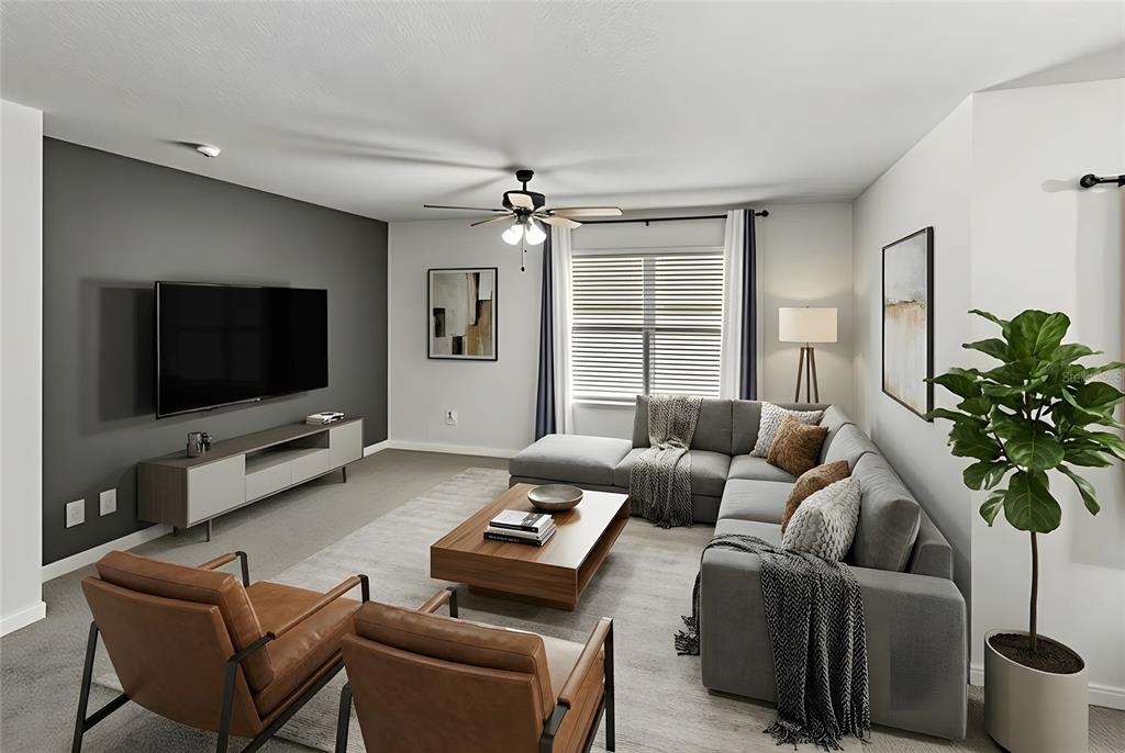 This is a digital rendering of a living room with gray walls, a sectional, and chairs — 22608 NW 196TH LANE, HIGH SPRINGS, FL