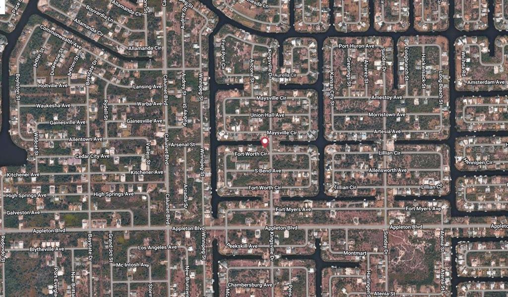 This is an aerial map view of a residential neighborhood with canal-front properties — 10181 KINGSVILLE DRIVE, PORT CHARLOTTE, FL