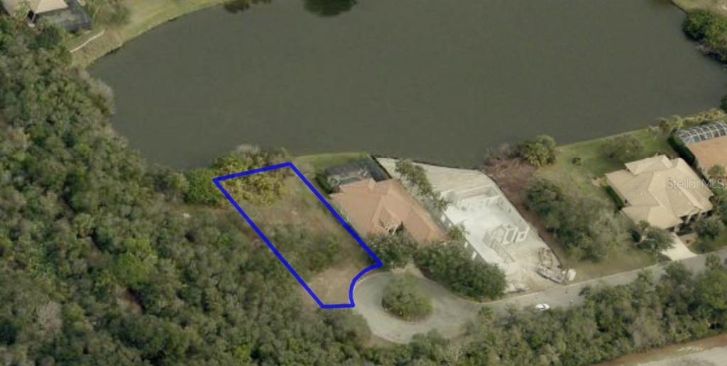 An aerial map view of a vacant, irregularly shaped residential lot labeled number 33 — 46 ATLANTIC PLACE, PALM COAST, FL