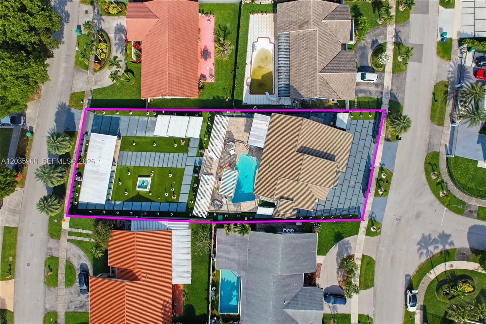 This aerial view shows a residential property with a swimming pool and landscaped backyard — 13330 SW 5th St, Miami FL 33184, MIAMI, FL