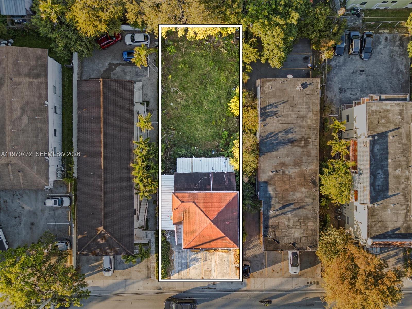 An aerial view shows a rectangular lot containing a house with a red roof — 937 SW 7th St, Miami FL 33130, MIAMI, FL