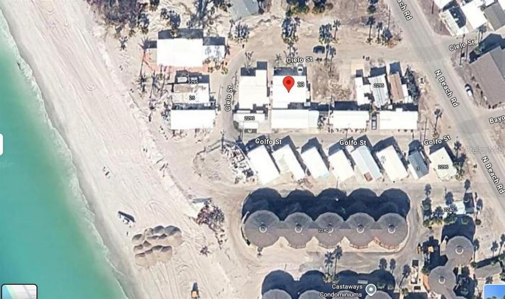 This is an aerial map view of a beachside property with several small buildings — 2295 N BEACH ROAD UNIT 23, ENGLEWOOD, FL