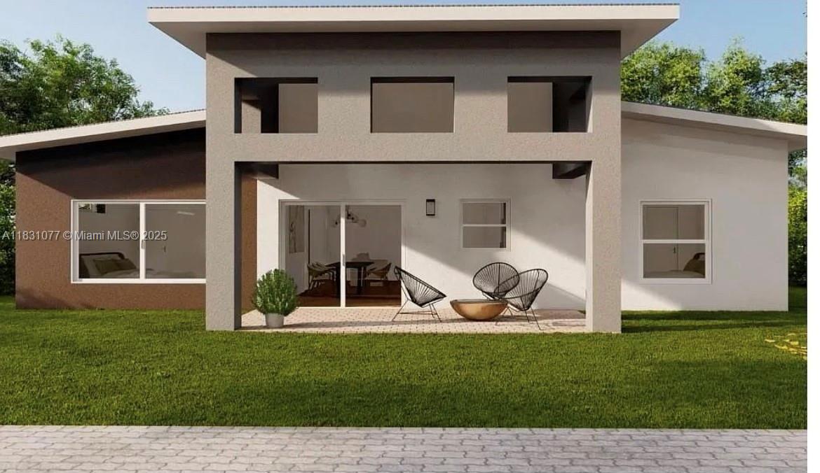 A rendering of a modern house exterior featuring a covered patio and a grassy yard — 2550 N ArrowHead RD # 2550, Avon Park FL 33825, AVON PARK, FL