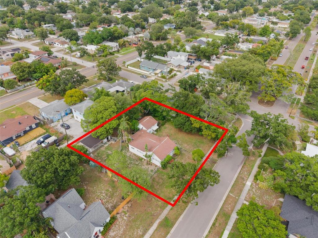 An aerial view shows a residential lot with a house and detached structure outlined red — 4605 8TH AVENUE N, ST PETERSBURG, FL