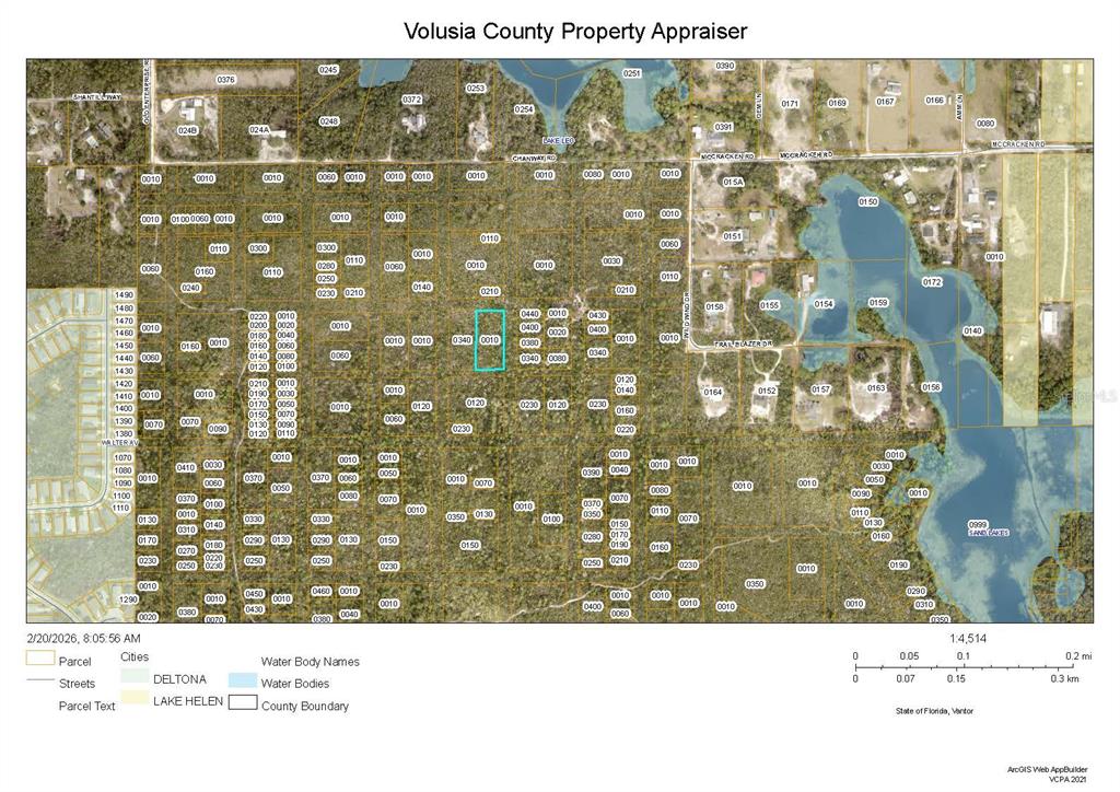 This is a property tax map showing parcel boundaries and water bodies in Volusia County — HON (PAPER) AVENUE, LAKE HELEN, FL