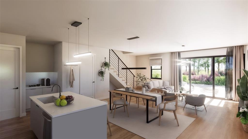 This rendering shows an open-concept kitchen, dining area, and living room with modern finishes — 5750 CYRILS ROAD TH FL LOT 17, ST CLOUD, FL