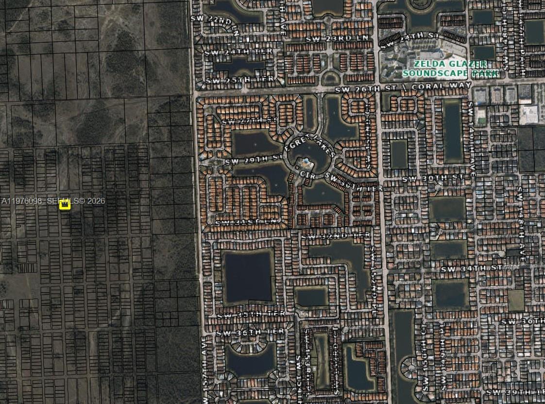 This is an aerial map showing a residential neighborhood adjacent to undeveloped land — n/a -, Miami FL 33175, MIAMI, FL